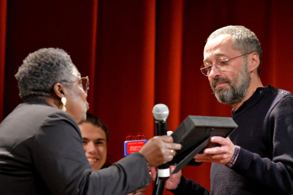 Charles accepting the award at the Rémalard Film Festival